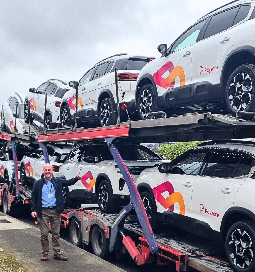 Payzone staff welcome arrival of new electric vehicle fleet