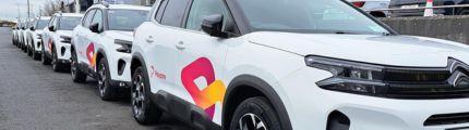 Payzone Electric vehicle fleet lined up on road